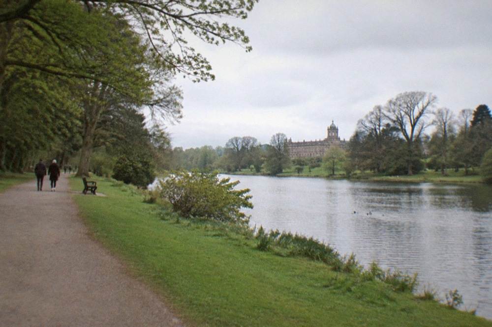 Open parkland and a lake at Heaton Park in north Manchester