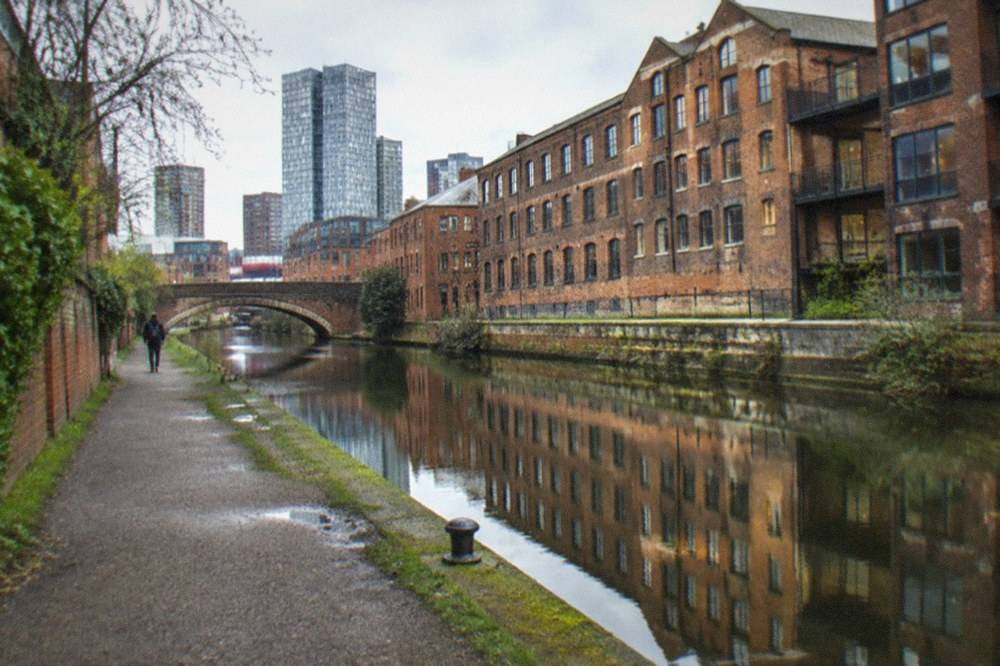 The Rochdale Canal towpath running past Canal Street in central Manchester